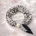 Scarf with rose print and pearl accent