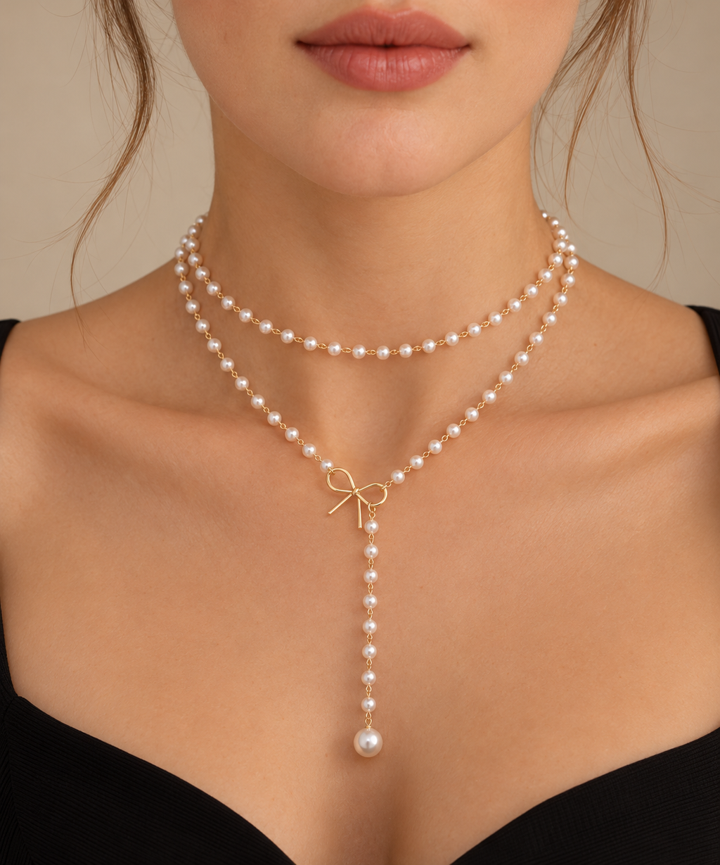 Collar de perlas de doble capa con detalle de lazo