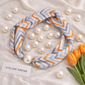 Scarf with Pearl Detail – Orange & Grey Zigzag